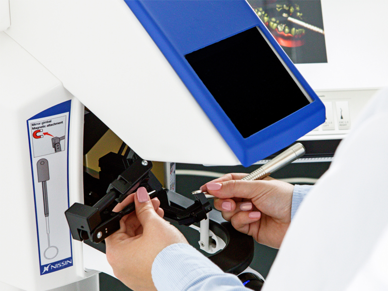 Dental professional using NEXDENT